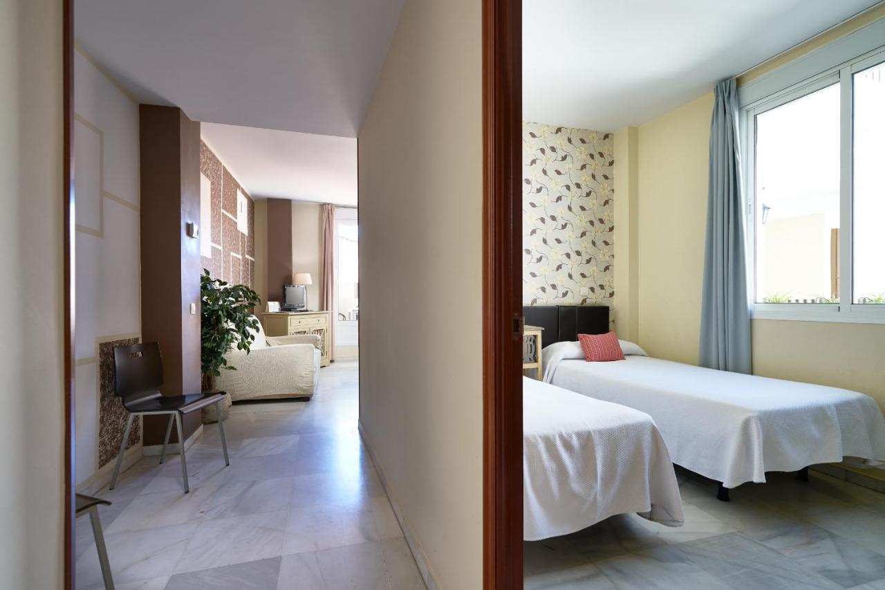 Apartamentos Las Cruces Севилья Экстерьер фото